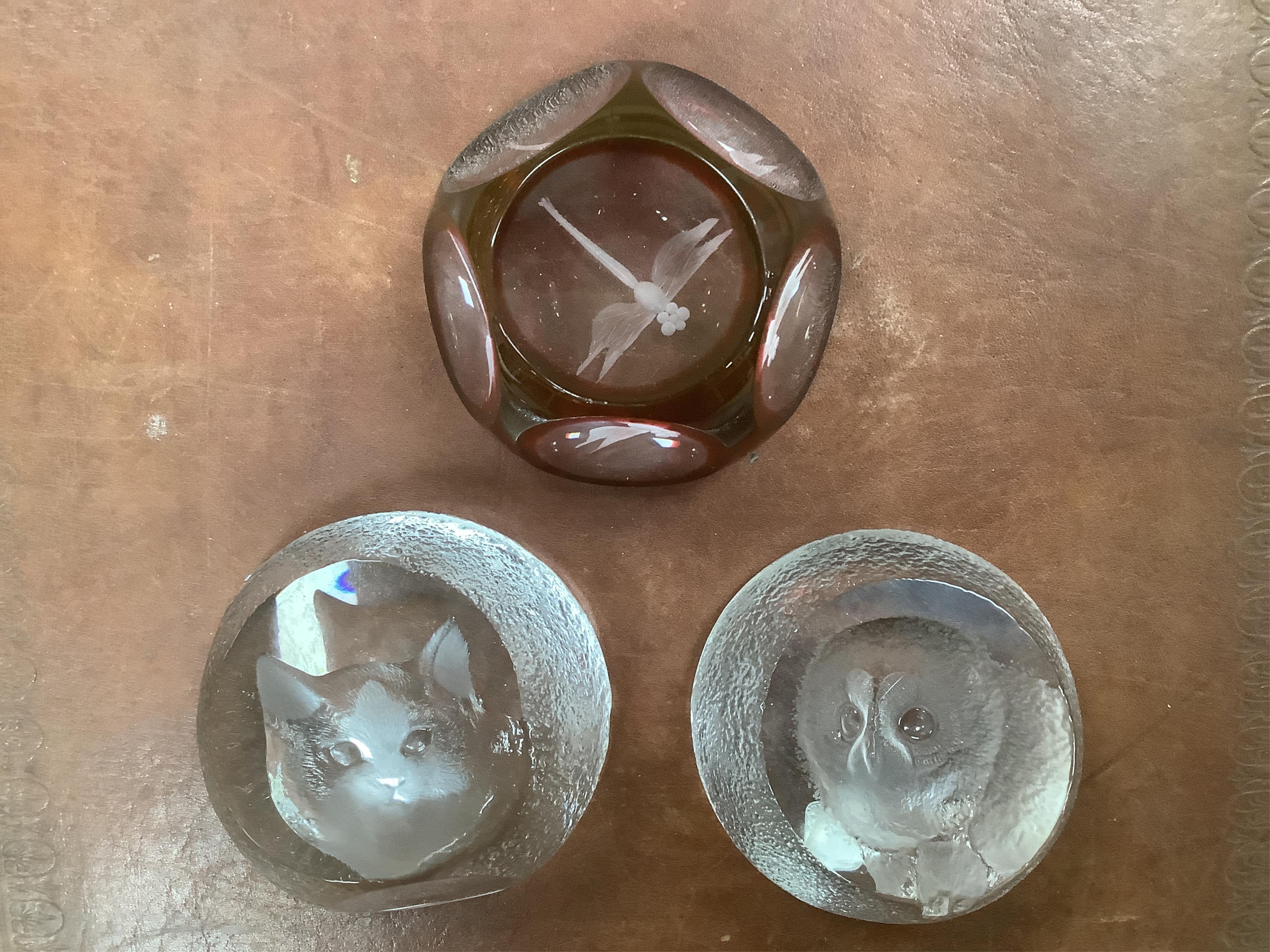 Twenty three glass paperweights, including five with silhouettes of animals, and others of unusual shape. Condition - good